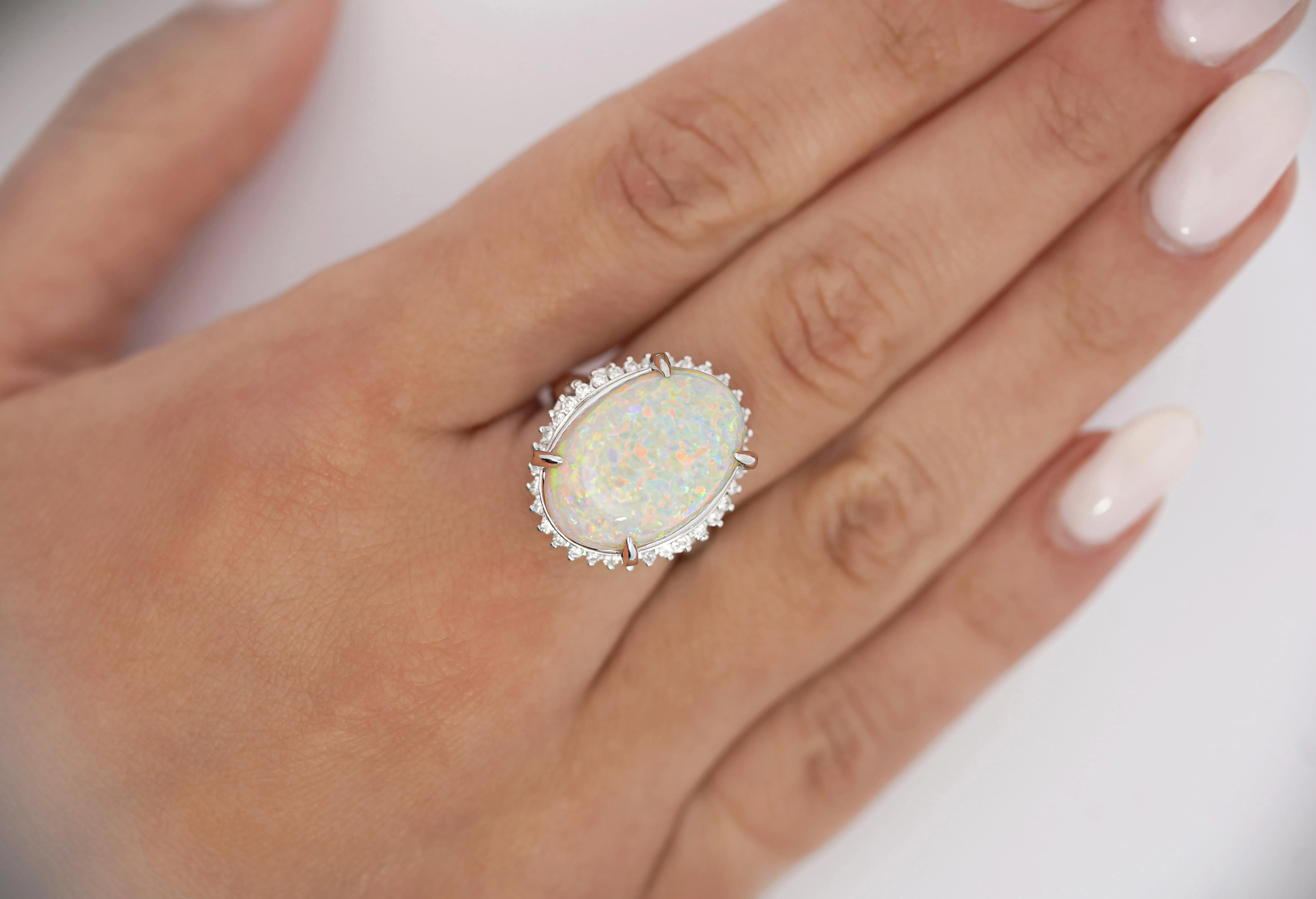 7.86 Carat Natural White Opal and Diamond Halo Platinum Ring